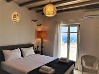 Posteľ alebo postele v izbe v ubytovaní Mando Pool Villas w Sea Views - Five Bedrooms