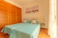 Łóżko lub łóżka w pokoju w obiekcie Marravilloso chalet Mes Blanc