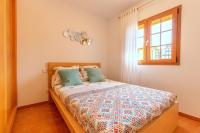 Łóżko lub łóżka w pokoju w obiekcie Marravilloso chalet Mes Blanc