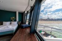 Un ou plusieurs lits dans un hébergement de l'établissement De Pier Suites