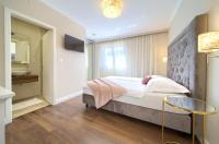 Łóżko lub łóżka w pokoju w obiekcie Luxury Apartments Villa Stina