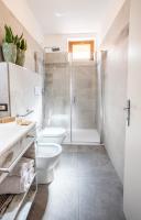 A bathroom at Hotel Residence La Pertica