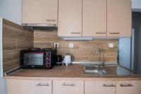Kuchyňa alebo kuchynka v ubytovaní Chelona Apartments
