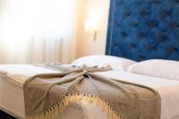 Łóżko lub łóżka w pokoju w obiekcie Luxury Apartments Villa Stina