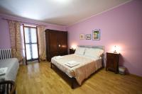 Posteľ alebo postele v izbe v ubytovaní B&B La Riundela