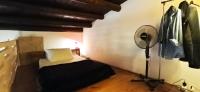 Posteľ alebo postele v izbe v ubytovaní Palermo Holiday Studio