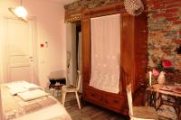 Postel nebo postele na pokoji v ubytování Le Dame Della Cortesella B&B