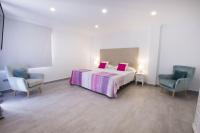 Posteľ alebo postele v izbe v ubytovaní Villas Guzman - Grandiosa