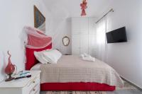 Posteľ alebo postele v izbe v ubytovaní Ricos Two Bedroom House - Naoussa Paros