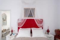 Posteľ alebo postele v izbe v ubytovaní Ricos Two Bedroom House - Naoussa Paros