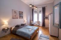 Posteľ alebo postele v izbe v ubytovaní Belvárosi Vintage Apartman a sétálóutcán