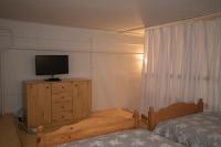 Posteľ alebo postele v izbe v ubytovaní Belvárosi Vintage Apartman a sétálóutcán