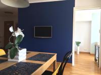 Televízia a/alebo spoločenská miestnosť v ubytovaní Fregata Apartment Gdynia