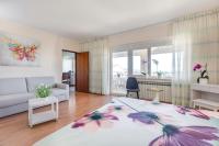Łóżko lub łóżka w pokoju w obiekcie Apartmani PARADISO