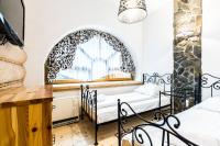 Posteľ alebo postele v izbe v ubytovaní Apartament Harnasiowa Grota