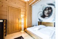 Posteľ alebo postele v izbe v ubytovaní Apartament Harnasiowa Grota