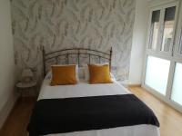 Posteľ alebo postele v izbe v ubytovaní Apartamentos Centro Malaga