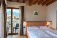 Posteľ alebo postele v izbe v ubytovaní Hotel Lido