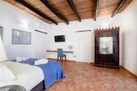 Posteľ alebo postele v izbe v ubytovaní Palazzo Marigliano - Rooms & Suites