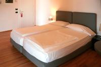 Posteľ alebo postele v izbe v ubytovaní Hotel Lido