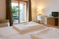 Posteľ alebo postele v izbe v ubytovaní Hotel Lido