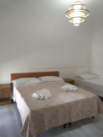 Posteľ alebo postele v izbe v ubytovaní B&B L'Antica Dimora ...e dei mestieri