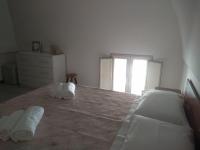 Posteľ alebo postele v izbe v ubytovaní B&B L'Antica Dimora ...e dei mestieri