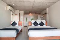 Ein Bett oder Betten in einem Zimmer der Unterkunft Wabi Sabi Boutique Hotel - SHA Extra Plus