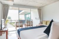Ein Bett oder Betten in einem Zimmer der Unterkunft Wabi Sabi Boutique Hotel - SHA Extra Plus