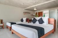 Ein Bett oder Betten in einem Zimmer der Unterkunft Wabi Sabi Boutique Hotel - SHA Extra Plus