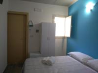 Posteľ alebo postele v izbe v ubytovaní B&B L'Antica Dimora ...e dei mestieri
