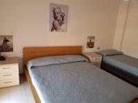 A bed or beds in a room at casa fronte mare