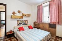 Posteľ alebo postele v izbe v ubytovaní Camogli Bright Apartment with Parking