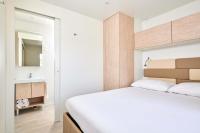 Posteľ alebo postele v izbe v ubytovaní Camping Stella Maris Mobile Homes