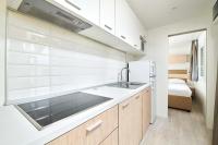 Kuchyňa alebo kuchynka v ubytovaní Camping Stella Maris Mobile Homes