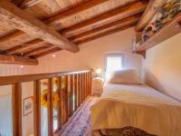 Łóżko lub łóżka w pokoju w obiekcie Villa Vista da Rocca di Papa-2 by Interhome