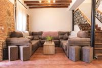 Posezení v ubytování La Casa de los Dos Rubios