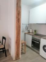 A kitchen or kitchenette at Apartamento en el Rastro