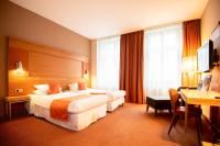 Postel nebo postele na pokoji v ubytování Mercure Ostrava Center