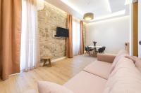 TV a/nebo společenská místnost v ubytování Casa Antika Suites