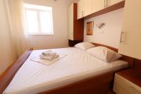 Postel nebo postele na pokoji v ubytování Apartment Dony - Tičić