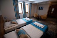 Posteľ alebo postele v izbe v ubytovaní Hotel EUROPA - Górnicza Strzecha