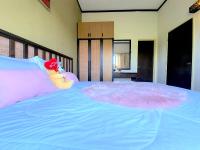 Gold Coast Morib Studio l Apartment I Penthouseにあるベッド