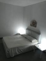 Posteľ alebo postele v izbe v ubytovaní Casa vacanza le tre palme