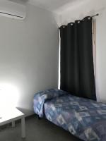 Posteľ alebo postele v izbe v ubytovaní Casa vacanza le tre palme