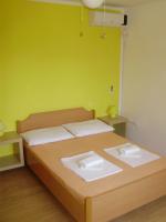 Łóżko lub łóżka w pokoju w obiekcie Villa Welcome
