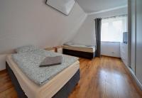 Posteľ alebo postele v izbe v ubytovaní Mega widok