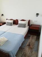 Posteľ alebo postele v izbe v ubytovaní Maria's Hotel