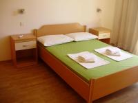 Łóżko lub łóżka w pokoju w obiekcie Villa Welcome