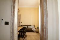 A bed or beds in a room at Ai due Mori Apt by Addler House Ospitality